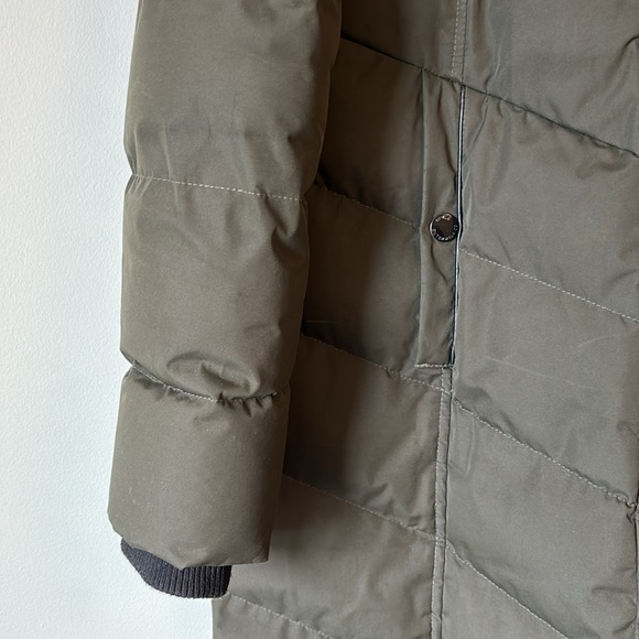 Convertible and cozy warm winter puffer in dark green with black accents - Picture 2 of 10